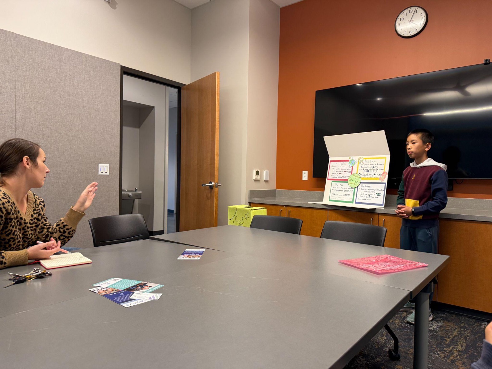 The hand-built recycling bin painted tennis-green at the courts.